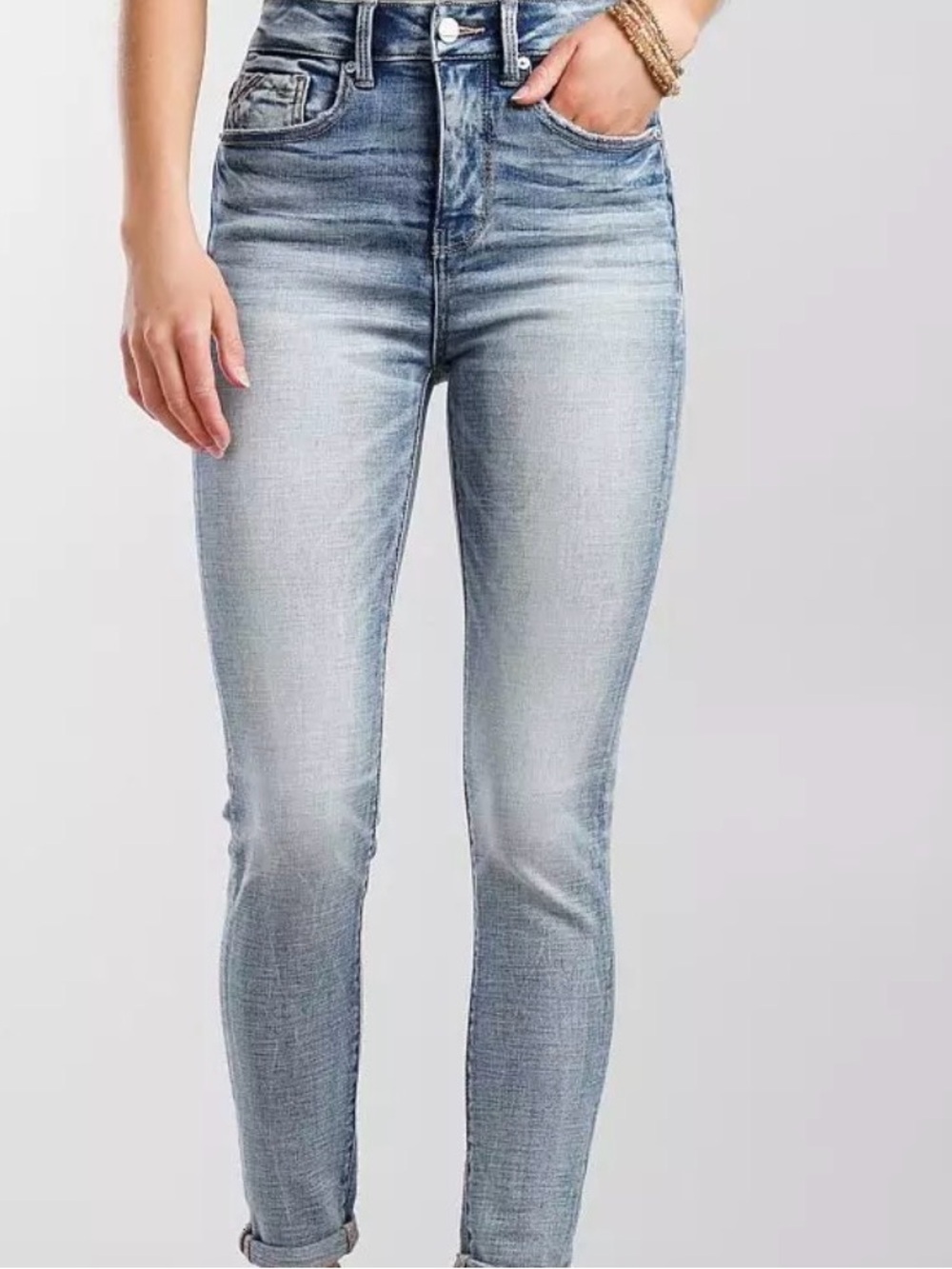 Buckle skinny jeans in a light-wash distressed denim Size 31